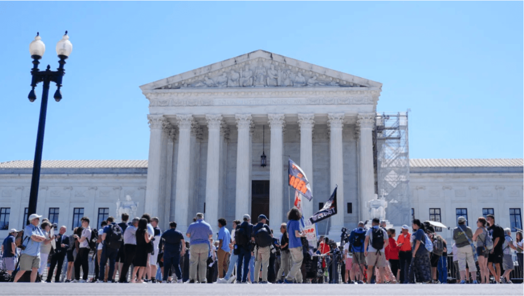 Protesters gather outside the Supreme Court on July 1, 2024, the day of its historic ruling on presidential immunity.